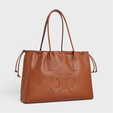 celine cuir triomphe drawstring bag|CELINE Smooth Calfskin Cuir Small Triomphe Cabas Drawstring .